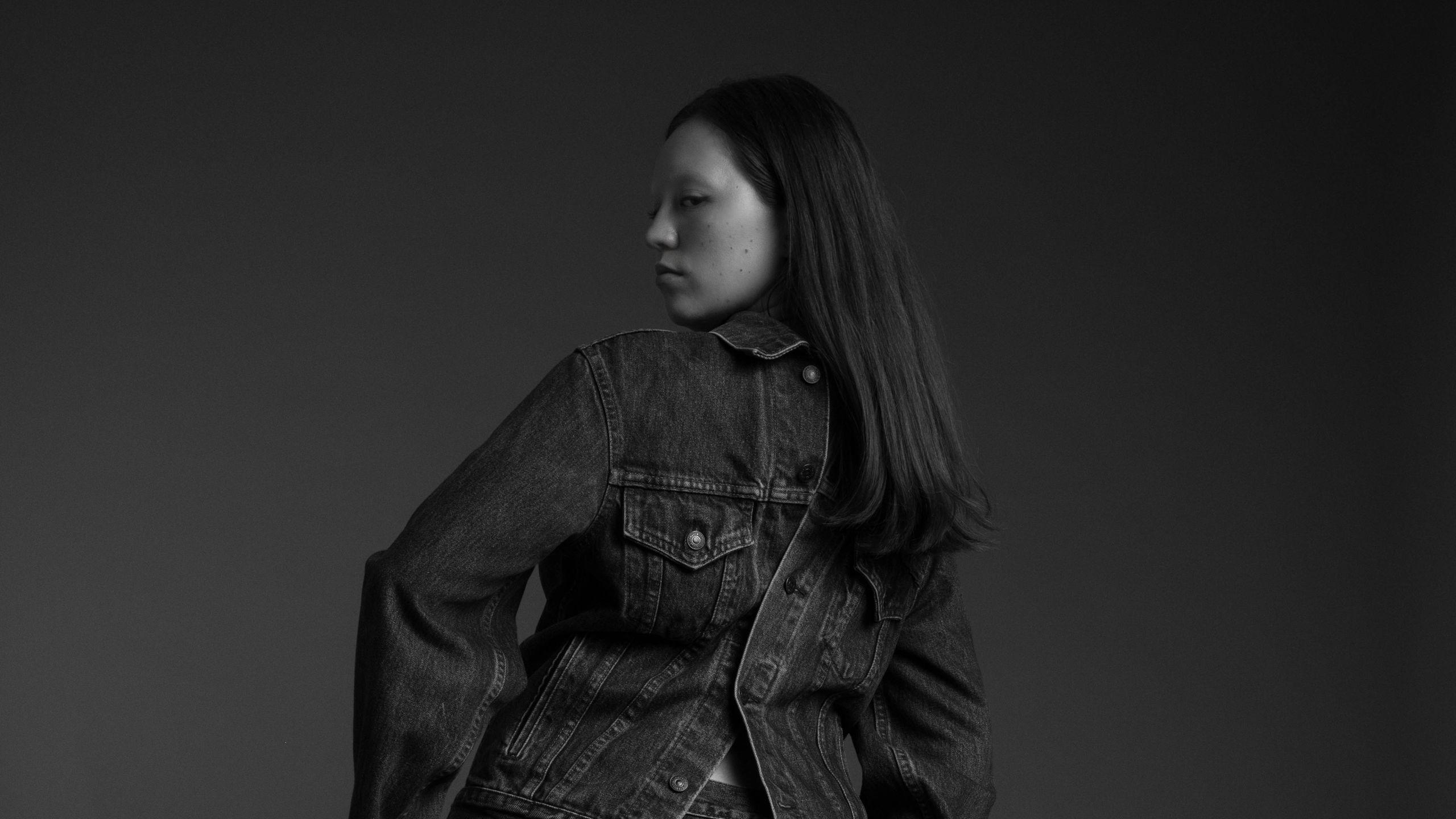 Beacasso's studio portrait of a woman in denim on the Fujifilm X-T50