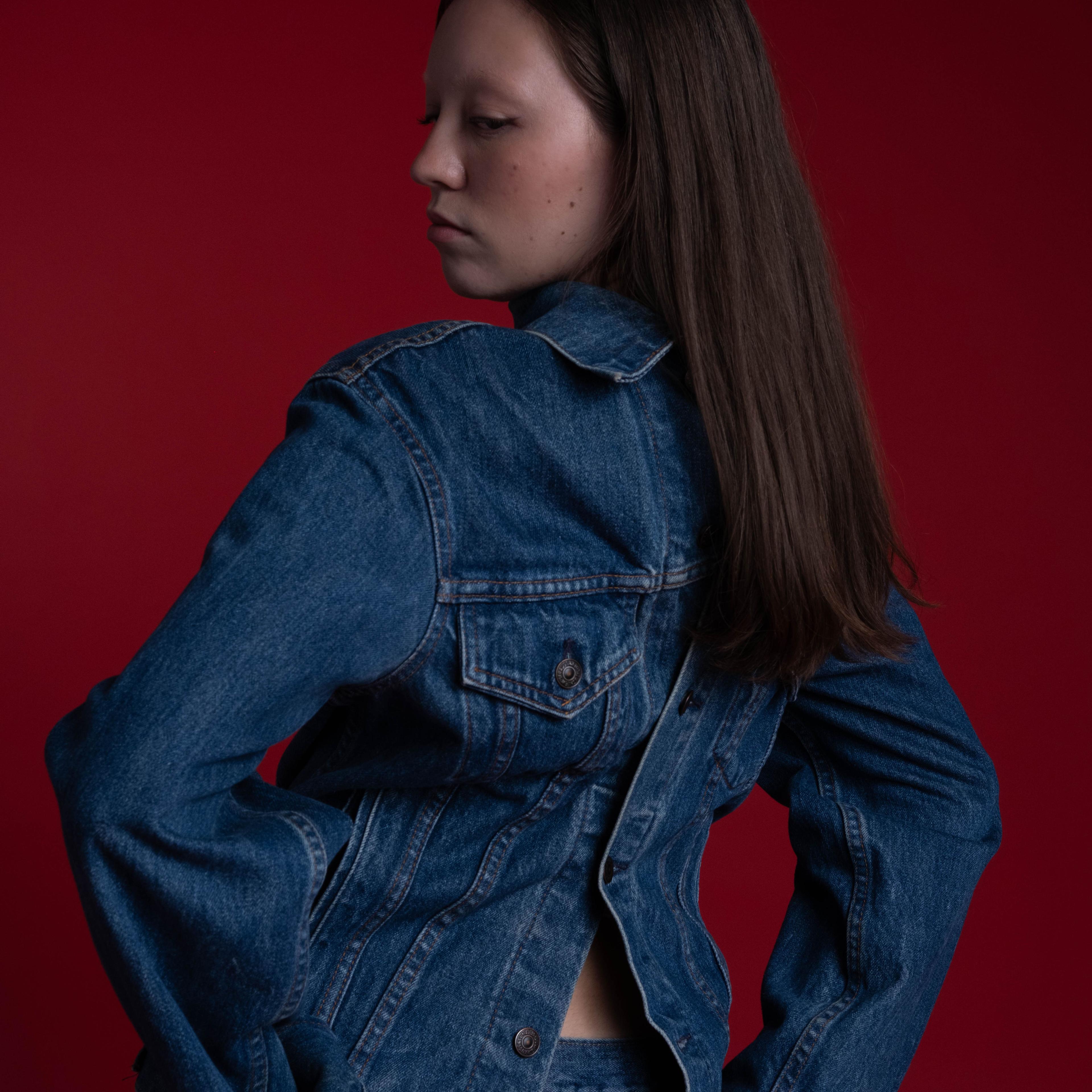 Beacasso's studio portrait of a woman in denim on the Fujifilm X-T50